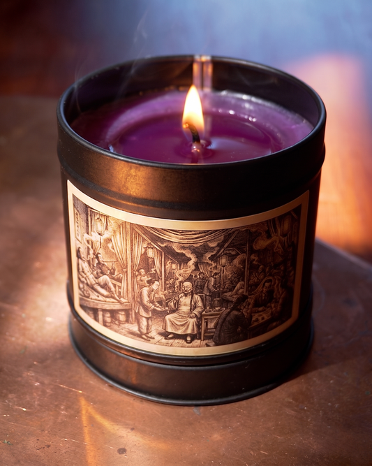 Vietnamese Night Market scented candle burning in a matte black tin with vintage engraving label — Wayward