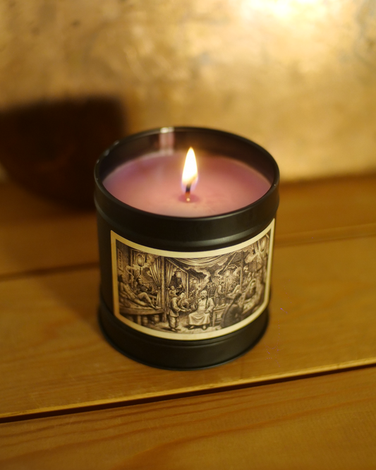 Vietnamese Night Market scented candle burning in a matte black tin with vintage engraving label — Wayward